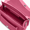 Ella aus genarbtem Leder in Pink mit silbernen Metallapplikationen, offen, leer, von oben in die Tasche fotografiert Ella aus genarbtem Leder in Pink mit silbernen Metallapplikationen, offen, leer, von oben in die Tasche fotografiert